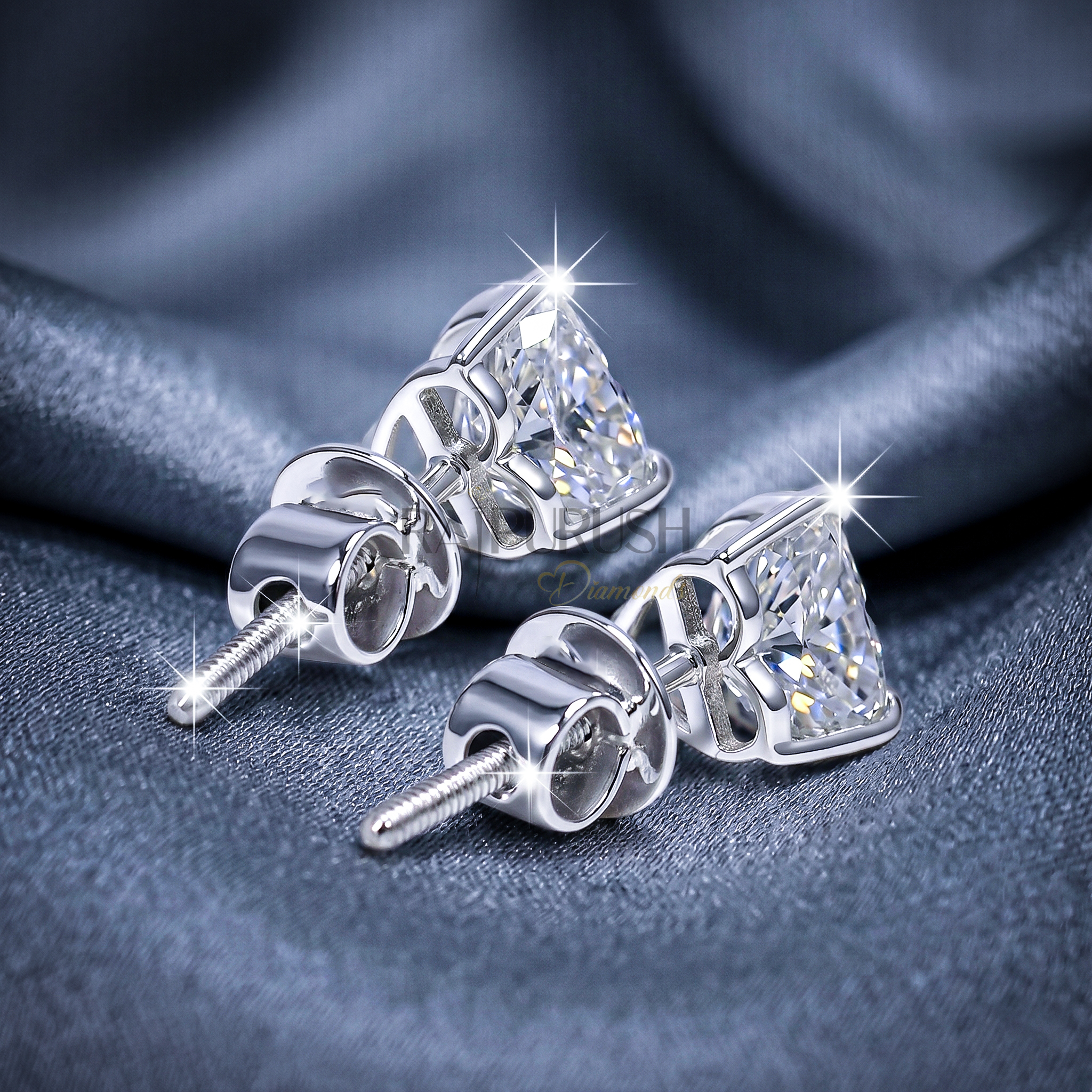 brilliant heart-shaped moissanite stud earrings in 14k yellow gold plated sterling silver, showcasing their fire and sparkle.