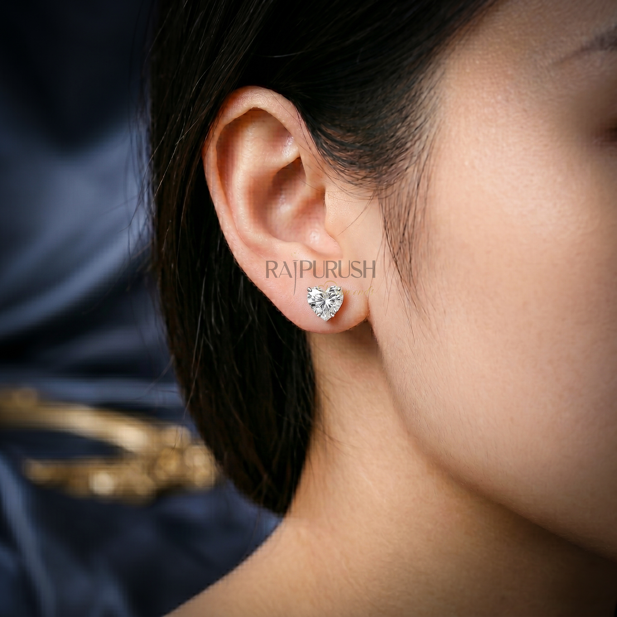 brilliant heart-shaped moissanite stud earrings in 14k yellow gold plated sterling silver, showcasing their fire and sparkle.