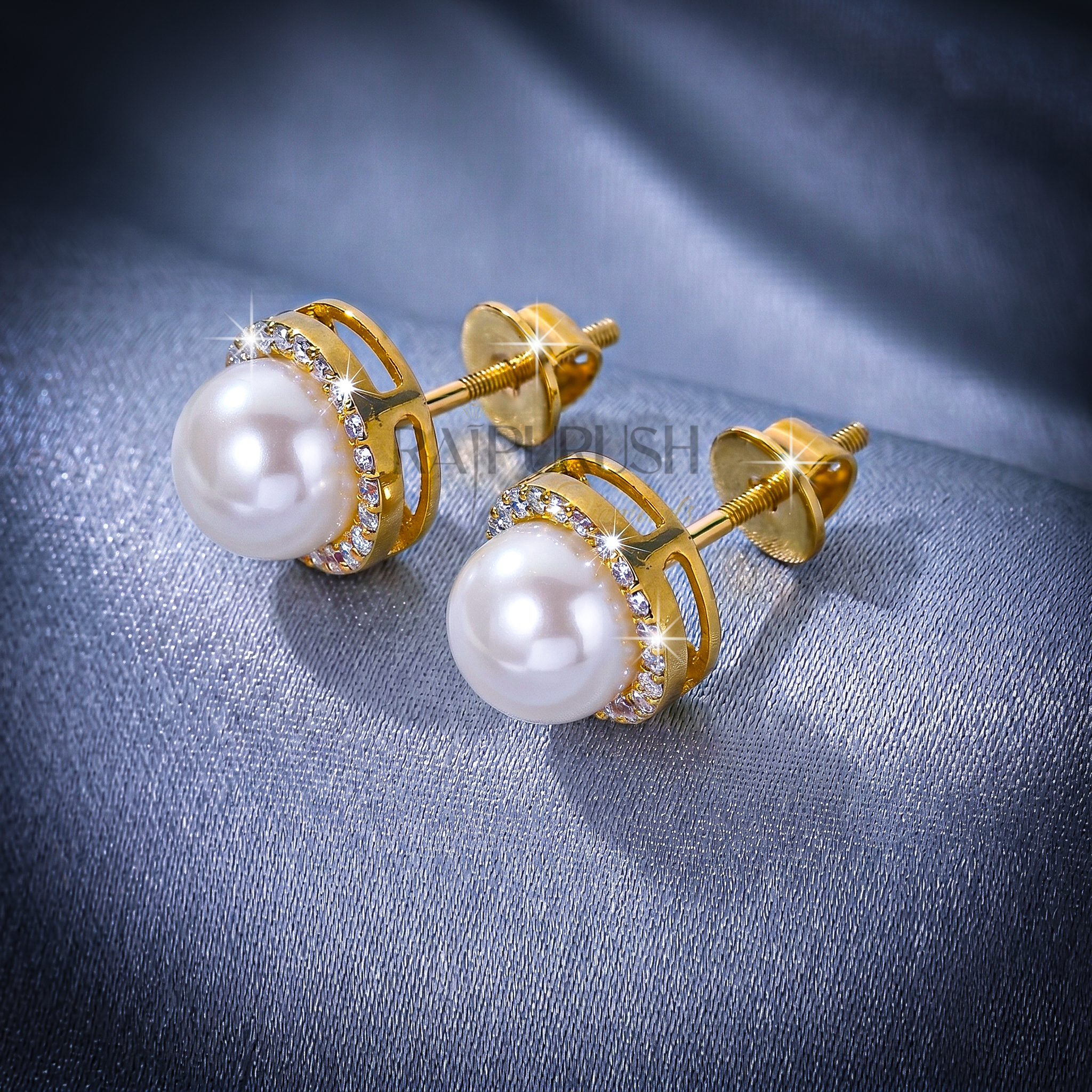 Elegant round pearl stud earrings surrounded by a moissanite halo in 14k gold plated sterling silver