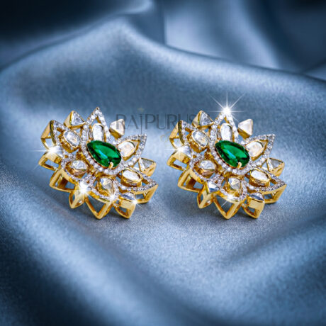 Luxury floral stud earrings featuring a central pear-cut emerald surrounded by Polki and round brilliant diamonds in 18K gold