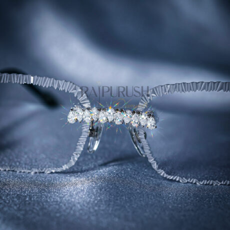 Luxury transparent frame glasses adorned with sparkling pear and round-cut moissanite diamonds on the bridge and hinges