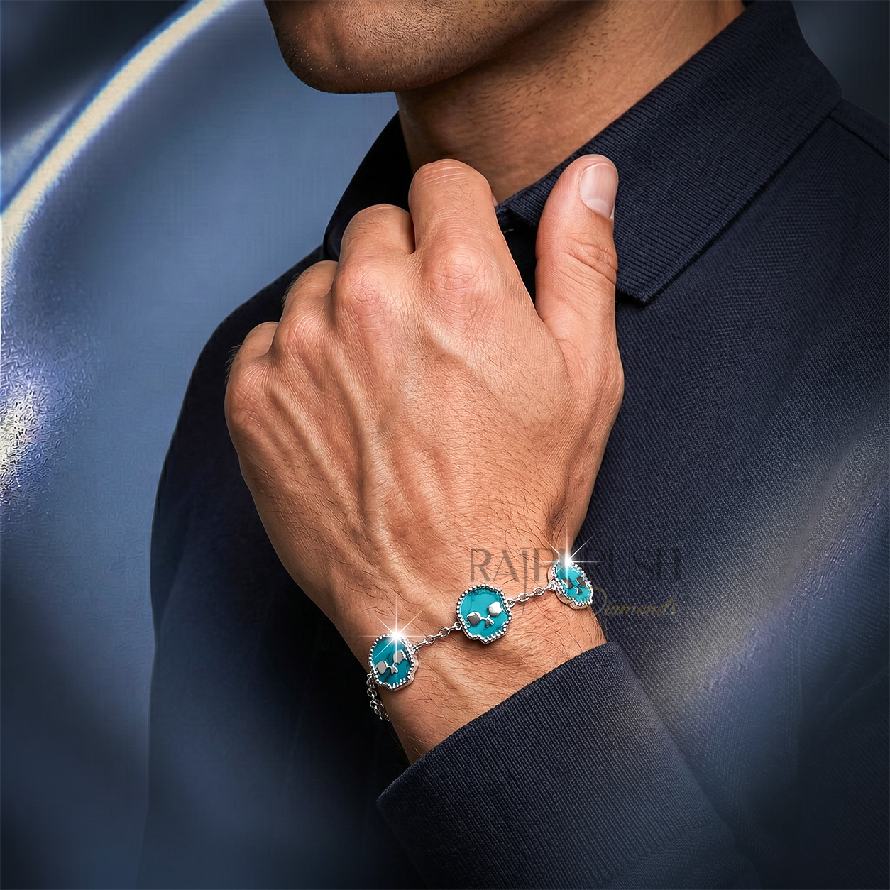 Unisex 925 sterling silver hip hop station bracelet featuring five skull-shaped turquoise stones framed with milgrain borders.Full length view of an edgy streetwear turquoise skull link chain bracelet laid out on a shimmering blue satin surface.