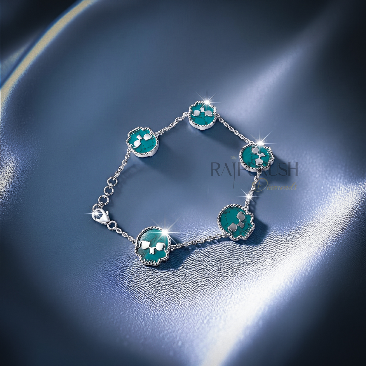 Unisex 925 sterling silver hip hop station bracelet featuring five skull-shaped turquoise stones framed with milgrain borders.Full length view of an edgy streetwear turquoise skull link chain bracelet laid out on a shimmering blue satin surface.