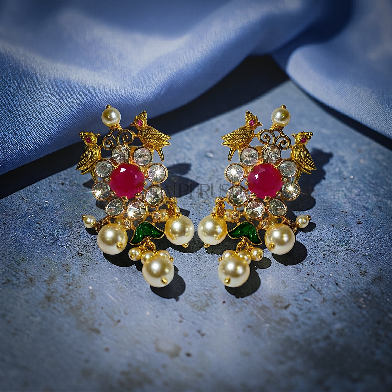 Traditional Indian heritage jewelry set featuring bird motifs with vibrant rubies and uncut Polki(uncut diamond)diamonds set in 18k yellow gold.