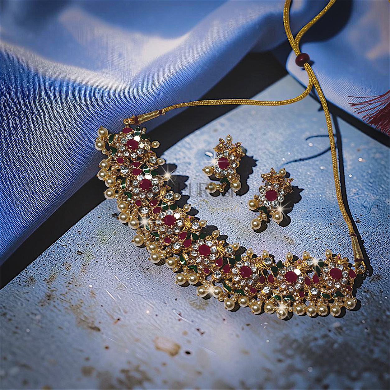 Traditional Indian heritage jewelry set featuring bird motifs with vibrant rubies and uncut Polki(uncut diamond)diamonds set in 18k yellow gold.