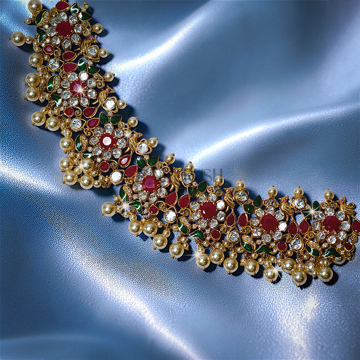Traditional Indian heritage jewelry set featuring bird motifs with vibrant rubies and uncut Polki(uncut diamond)diamonds set in 18k yellow gold.