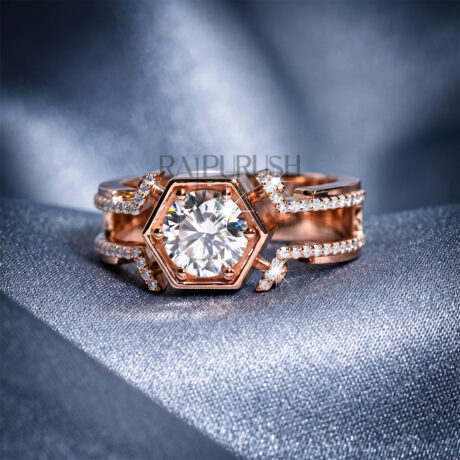 A luxurious men's ring in sterling silver featuring a brilliant round-cut moissanite stone in a unique geometric hexagon setting with side accents.