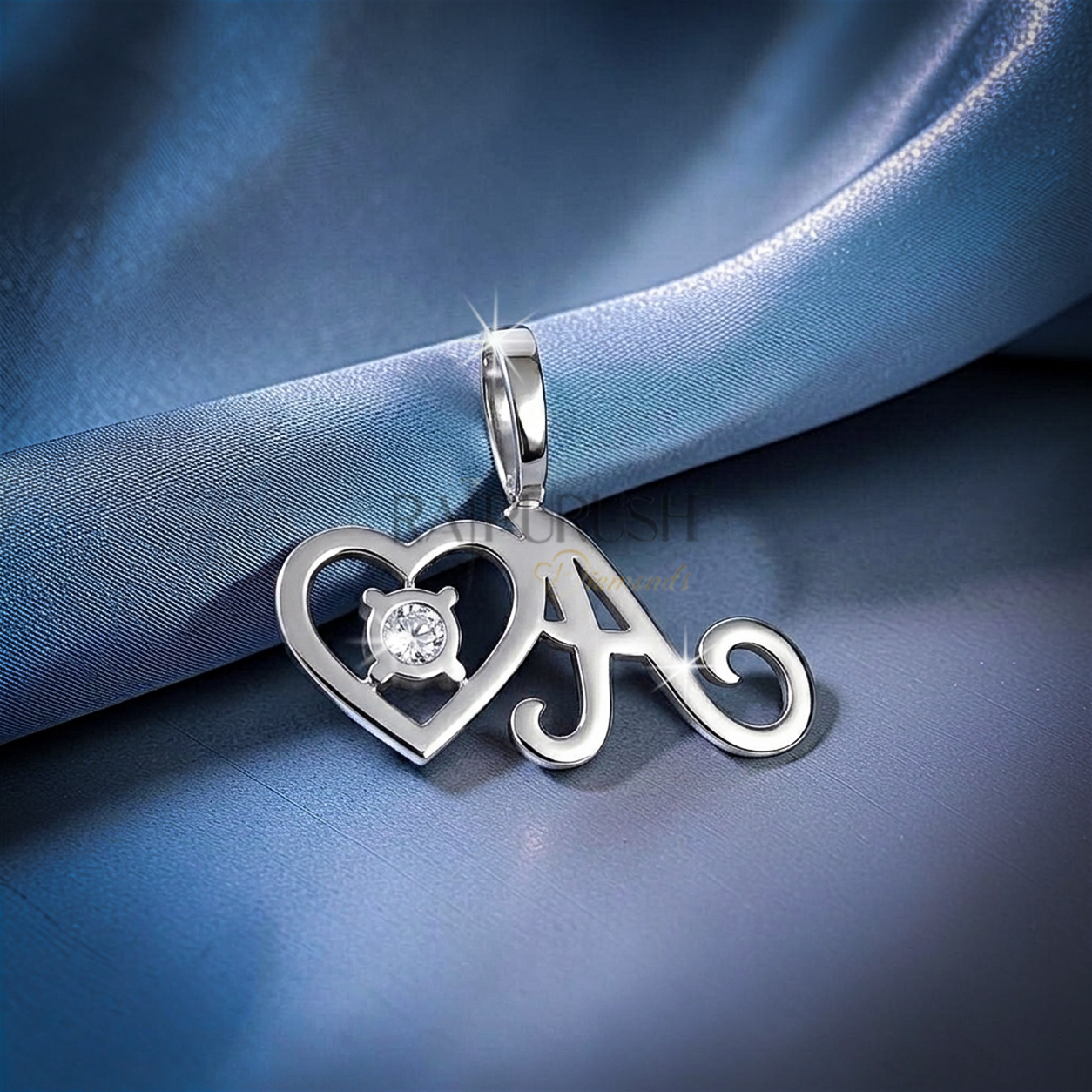 Fully iced-out 925 sterling silver custom script initial letter pendant accented with a small floating pavé moissanite heart.