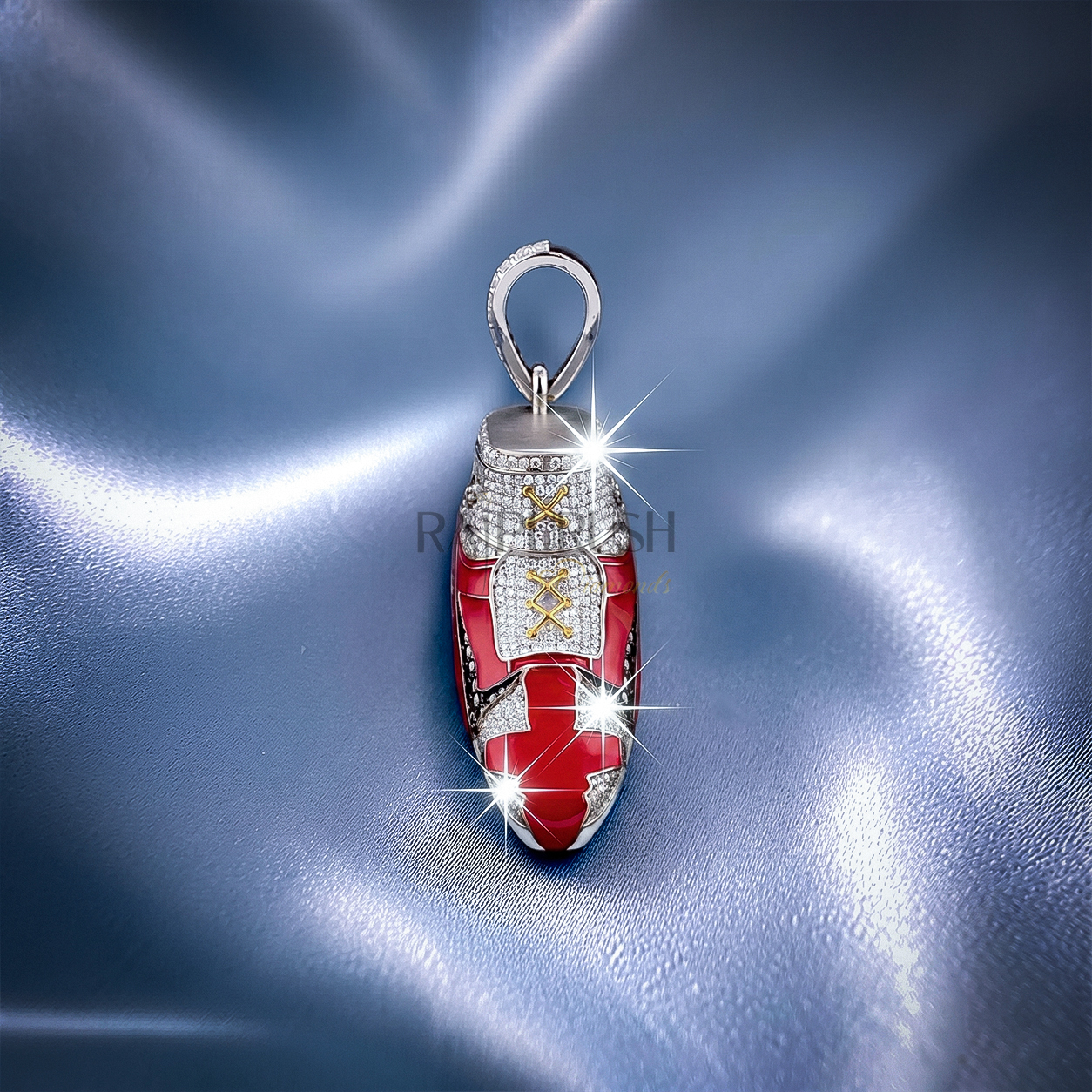 Detailed dynamic angle of a silver hip hop sneaker pendant completely flooded with round brilliant moissanite stones and vibrant red enamel accents.