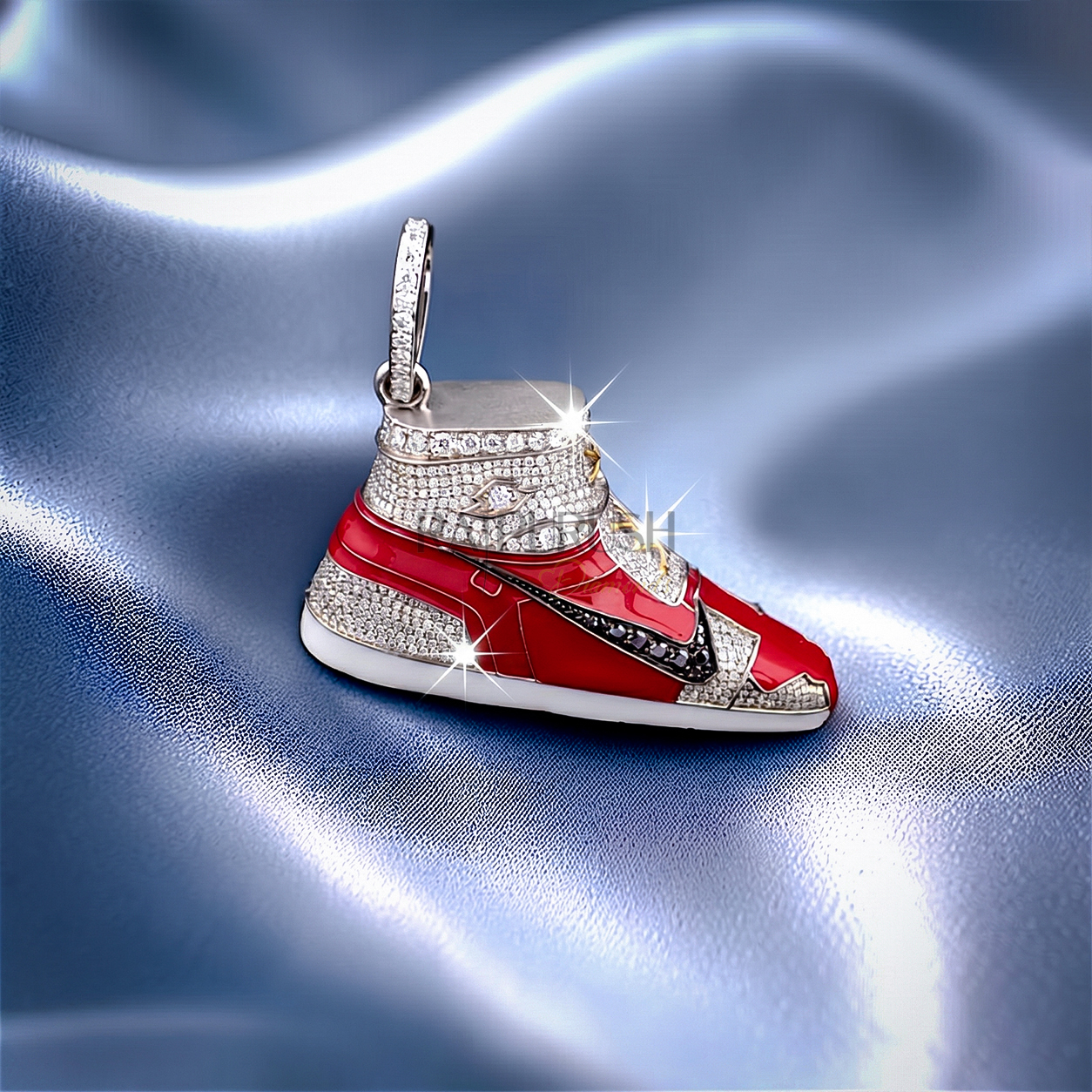 Detailed dynamic angle of a silver hip hop sneaker pendant completely flooded with round brilliant moissanite stones and vibrant red enamel accents.