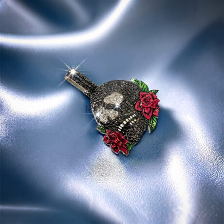 Heavily iced out hip hop skull pendant fully flooded with sparkling moissanite stones set in premium 925 sterling silver on blue silk.