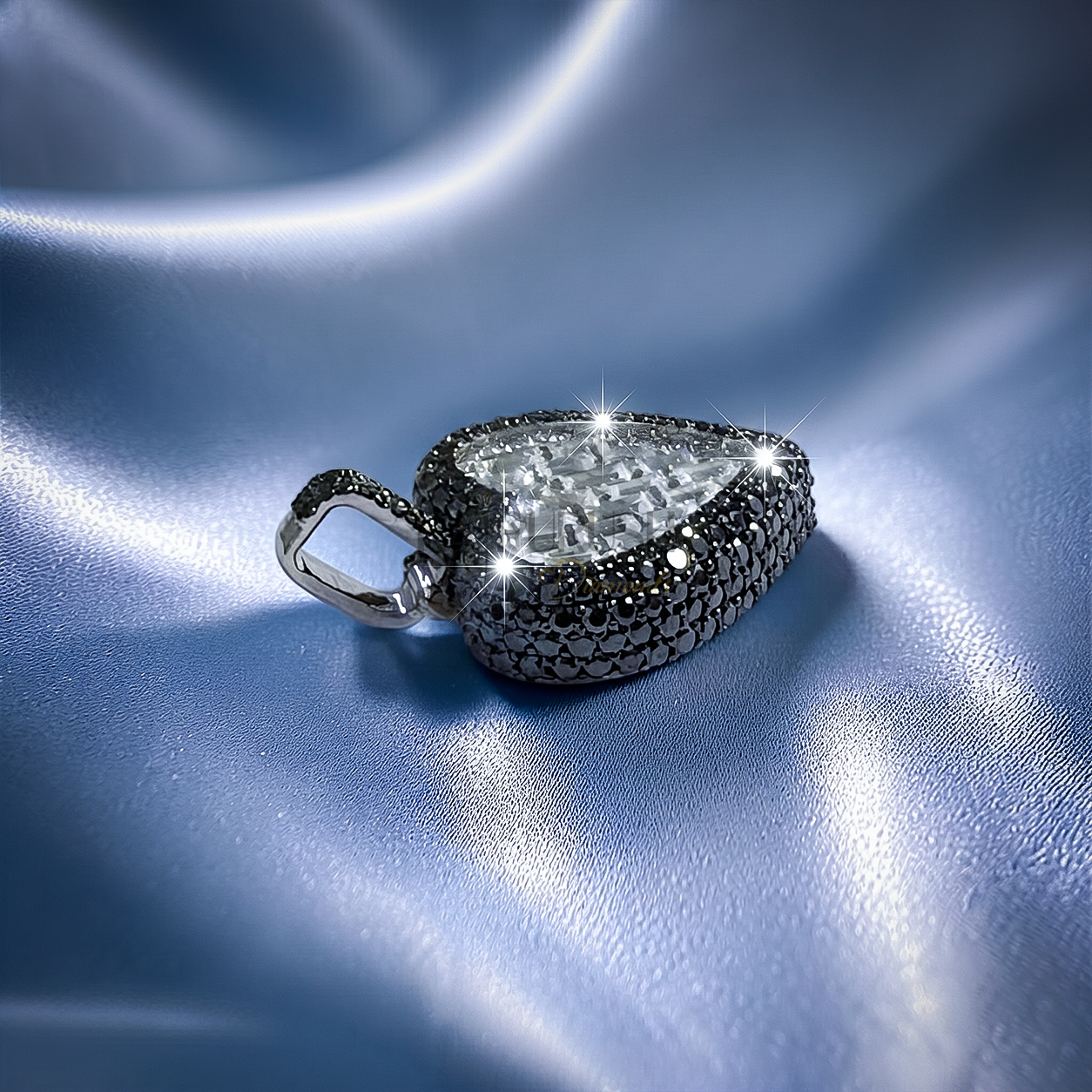 Bold iced-out heart pendant in 925 sterling silver featuring a center of seamless mosaic baguette diamonds bordered by a frame of black round moissanite stones.