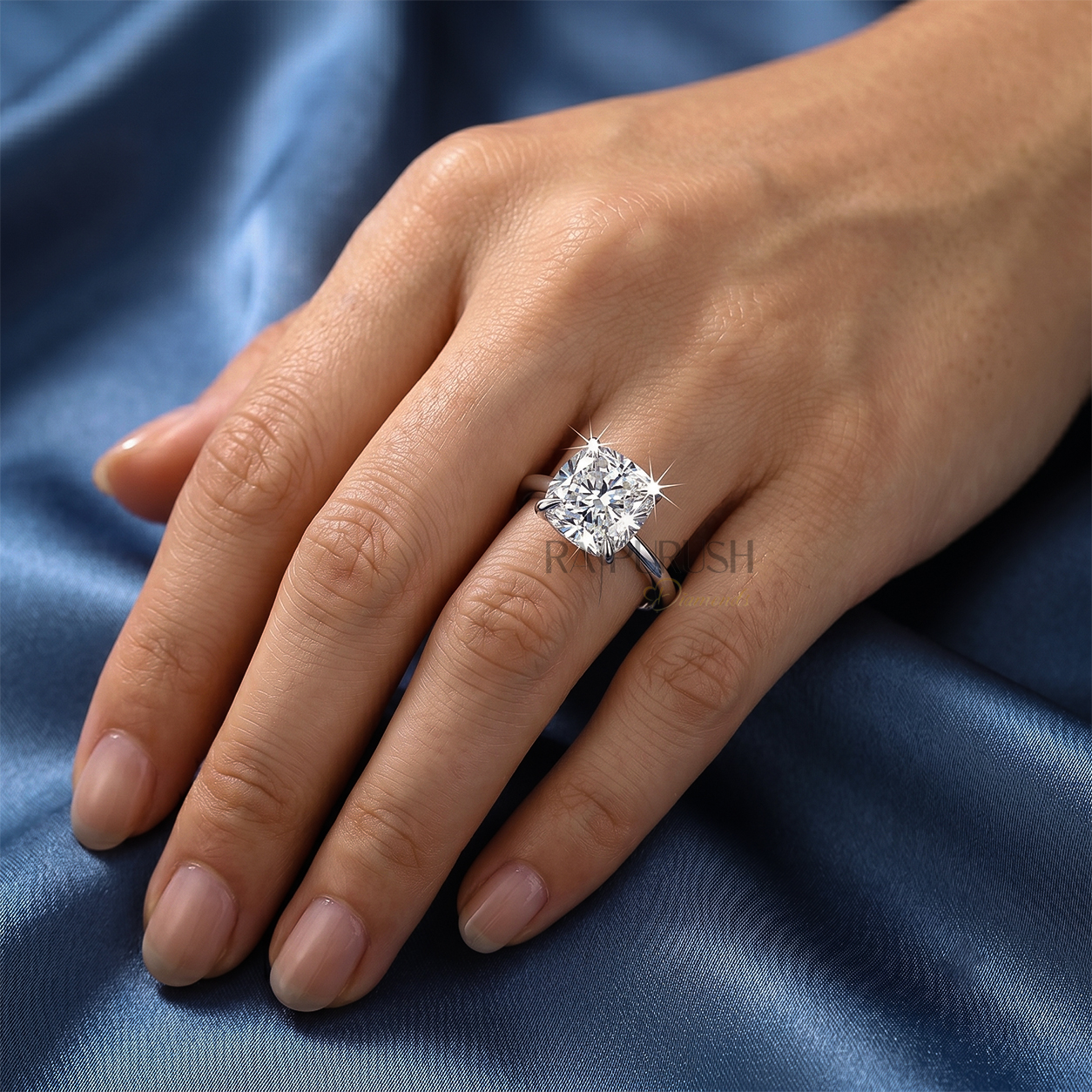 Elegant cushion-cut moissanite solitaire engagement ring in 925 sterling silver featuring a hidden halo basket