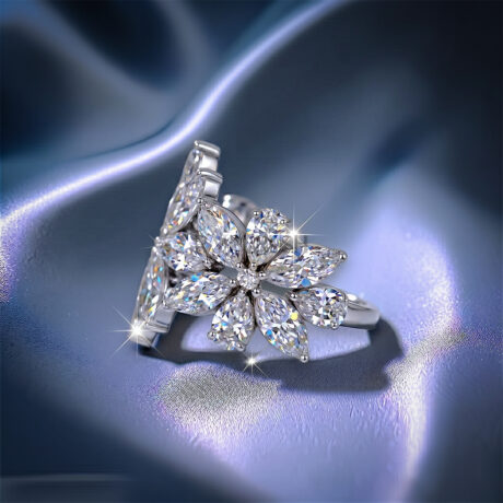Unique multi-shape cluster wedding band in 925 sterling silver showcasing an asymmetric scattered layout of round, pear, and marquise-cut moissanite diamonds.