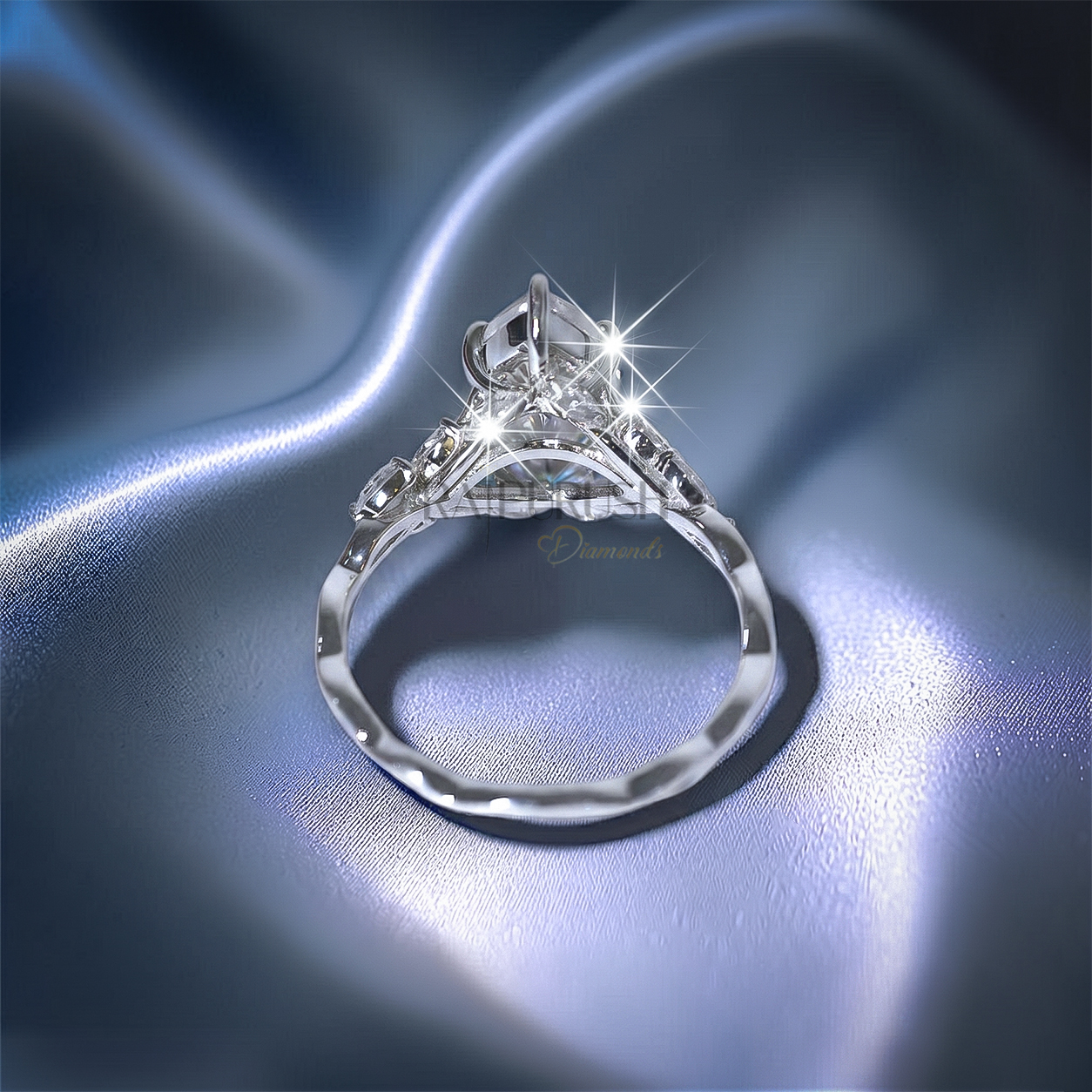 Modern 925 sterling silver engagement ring featuring a horizontally set marquise cut moissanite diamond solitaire on an ultra-dainty high-polish band.
