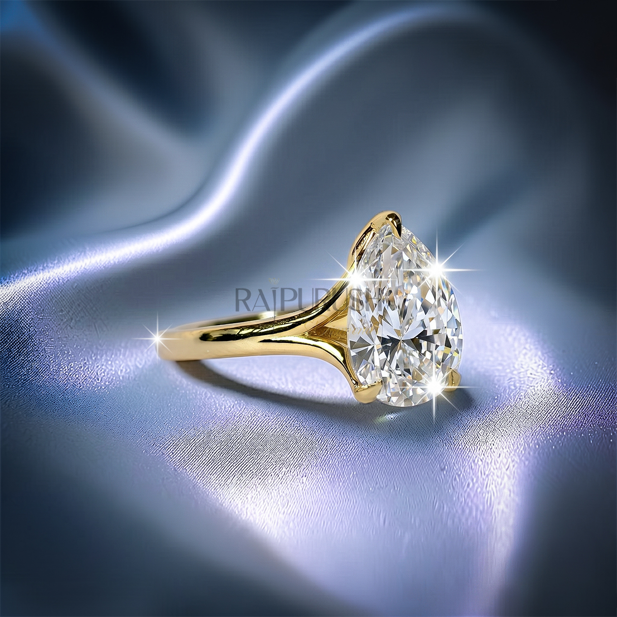 1 carat pear cut solitaire engagement ring in 14k yellow gold plated sterling silver, Side profile of a 1ct teardrop diamond simulant wedding ring showcasing a split shank cathedral setting. Under-gallery view of a gold plated pear cut solitaire ring showing the elegant open basket framework.