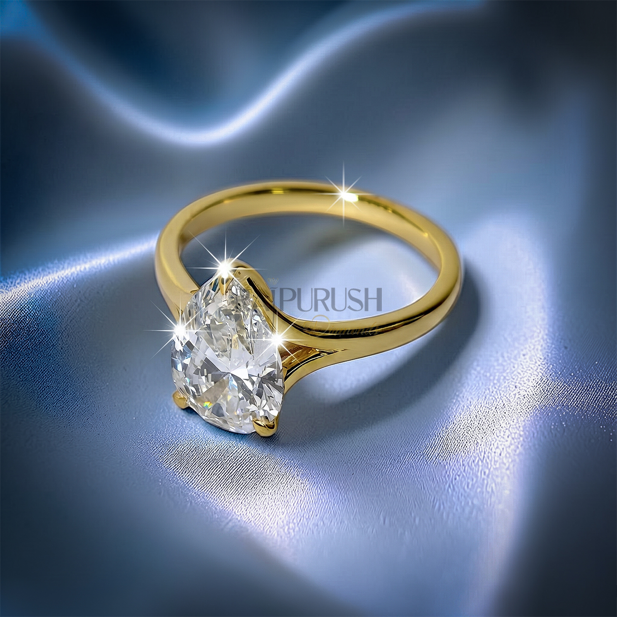1 carat pear cut solitaire engagement ring in 14k yellow gold plated sterling silver, Side profile of a 1ct teardrop diamond simulant wedding ring showcasing a split shank cathedral setting. Under-gallery view of a gold plated pear cut solitaire ring showing the elegant open basket framework.