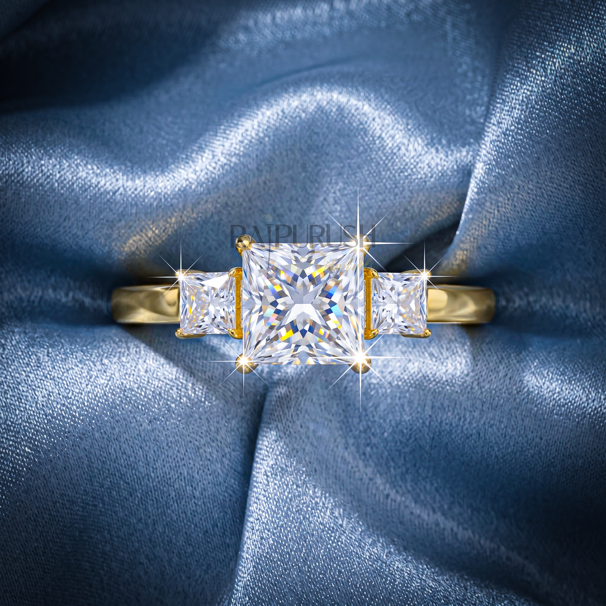 1.50 Carat princess cut moissanite engagement ring with two side stones in a classic three-stone setting, finished in 14k yellow/rose gold plating.