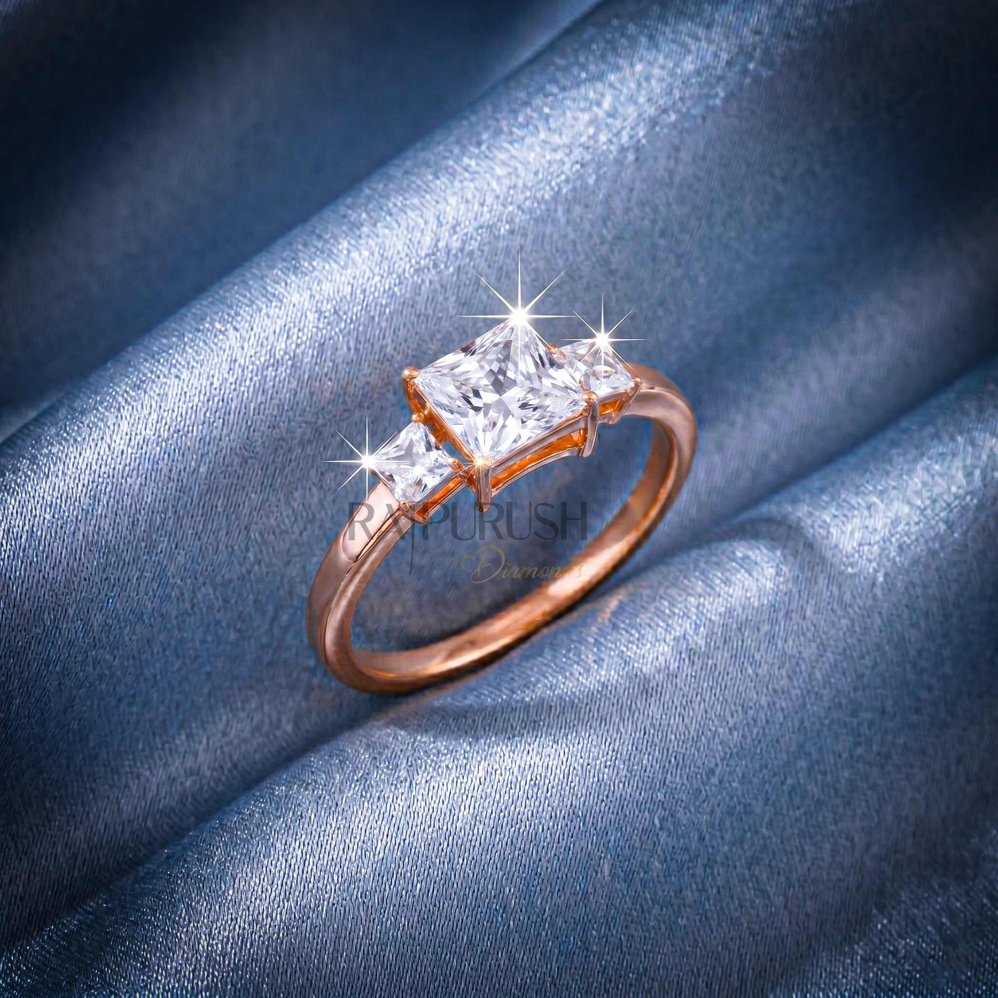 1.50 Carat princess cut moissanite engagement ring with two side stones in a classic three-stone setting, finished in 14k yellow/rose gold plating.