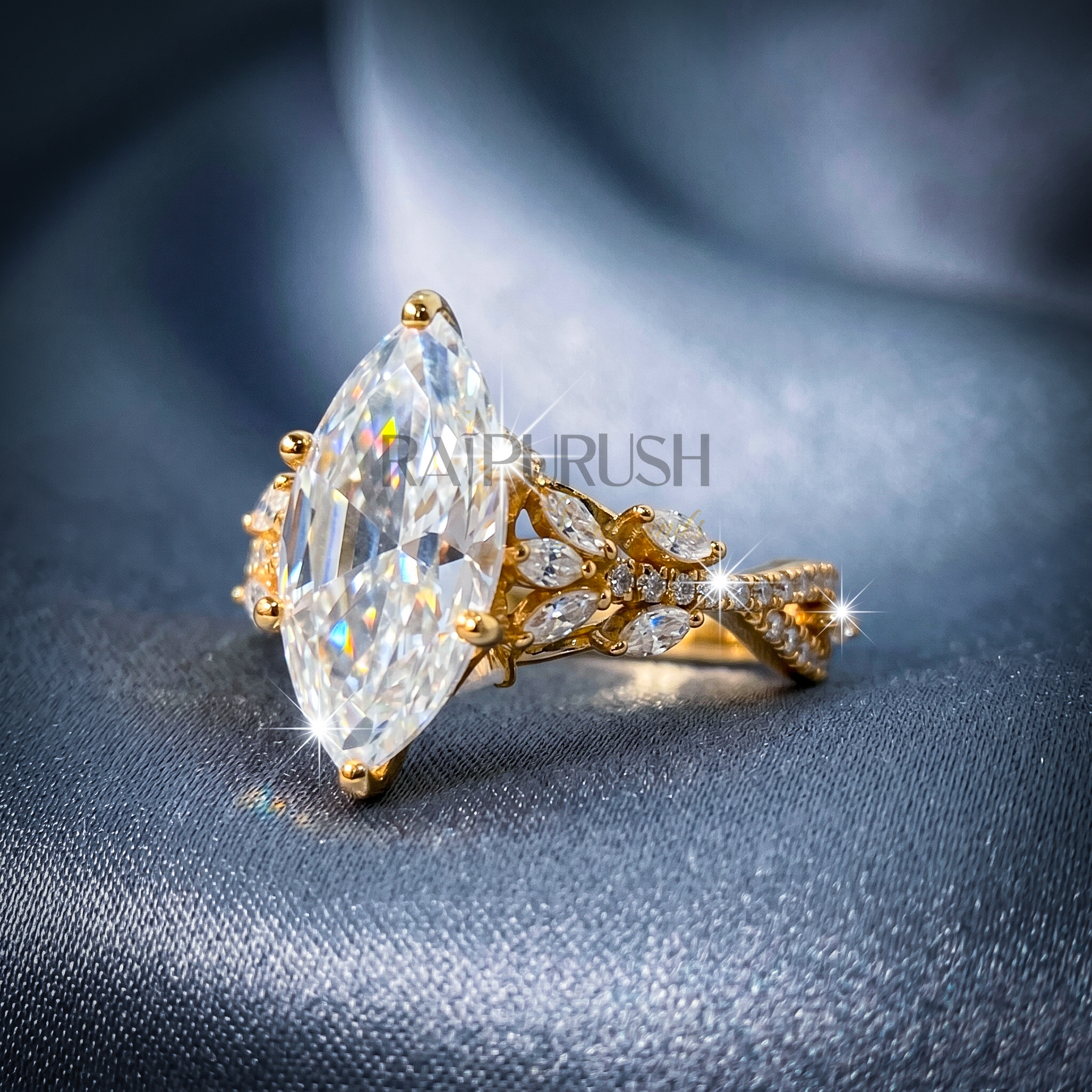 A stunning 3ct marquise-cut moissanite engagement ring featuring intricate side details in polished 14k yellow gold