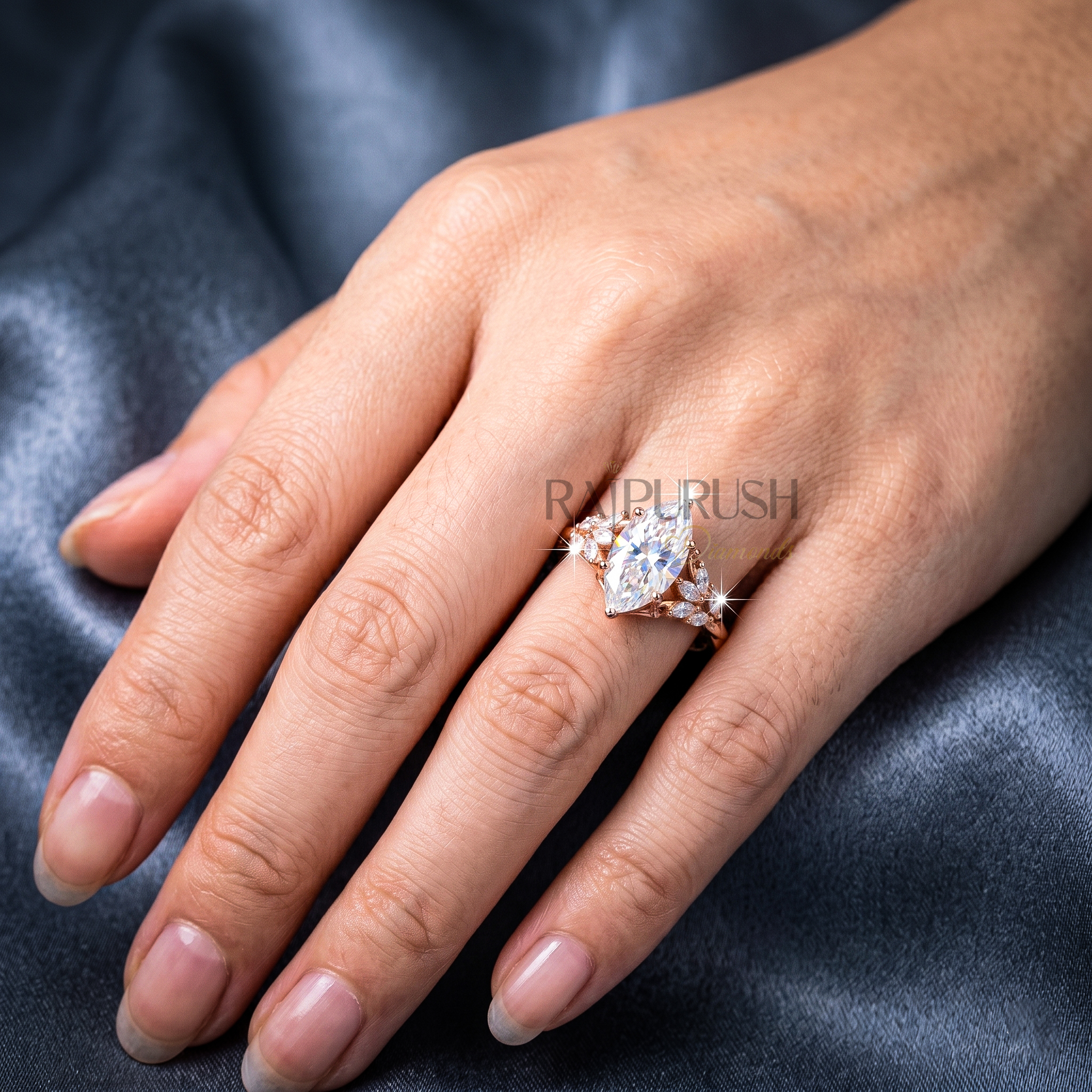 Modern 925 sterling silver engagement ring featuring a horizontally set marquise cut moissanite diamond solitaire on an ultra-dainty high-polish rose gold plating band