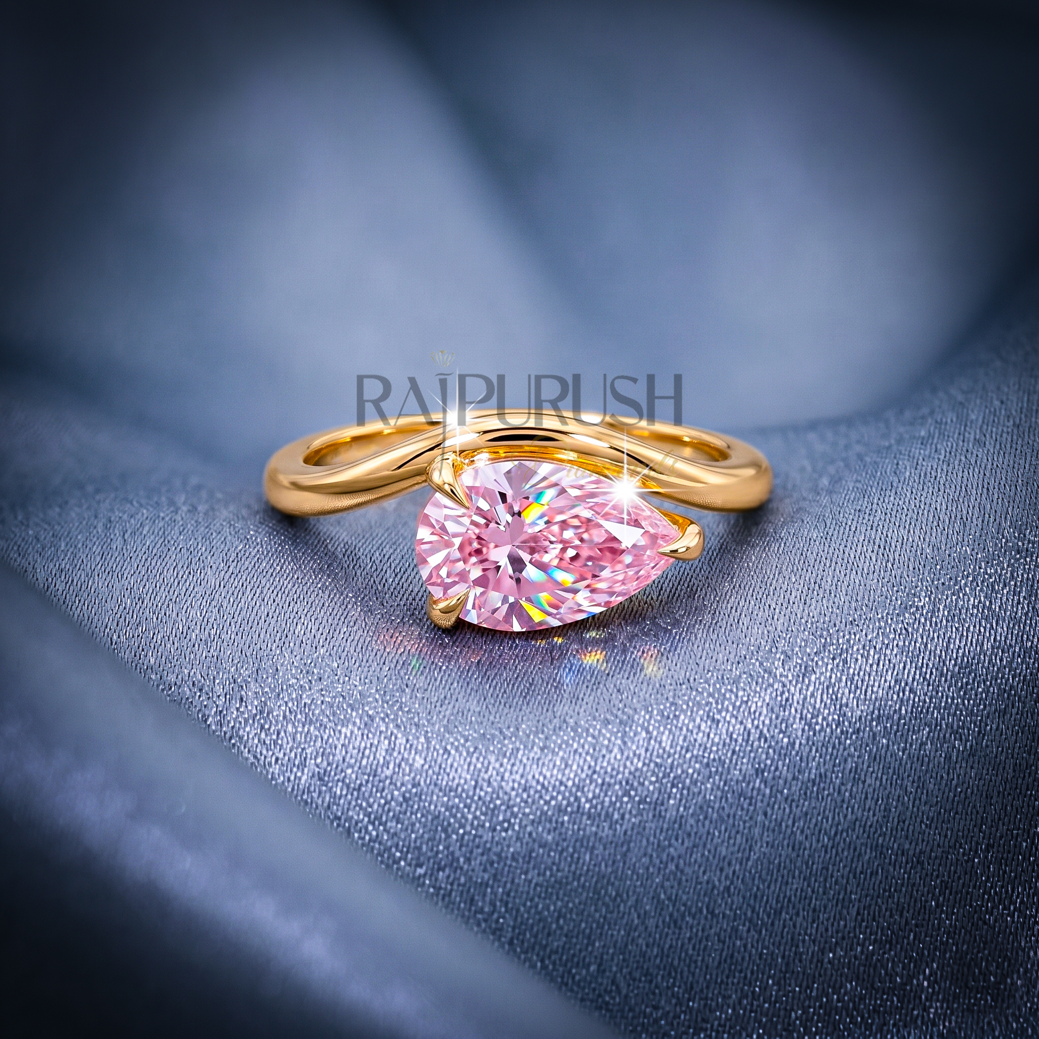 A stunning 1ct pear-cut moissanite solitaire engagement ring set in polished 14k gold