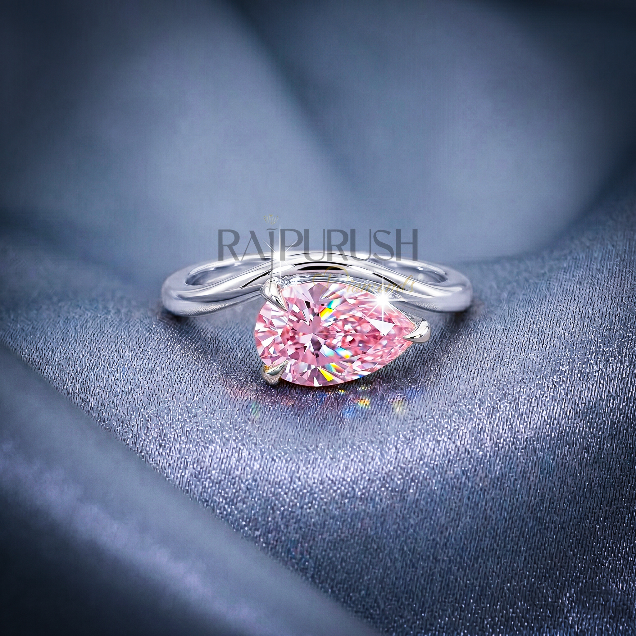 A stunning 1ct pear-cut moissanite solitaire engagement ring set in polished 14k gold