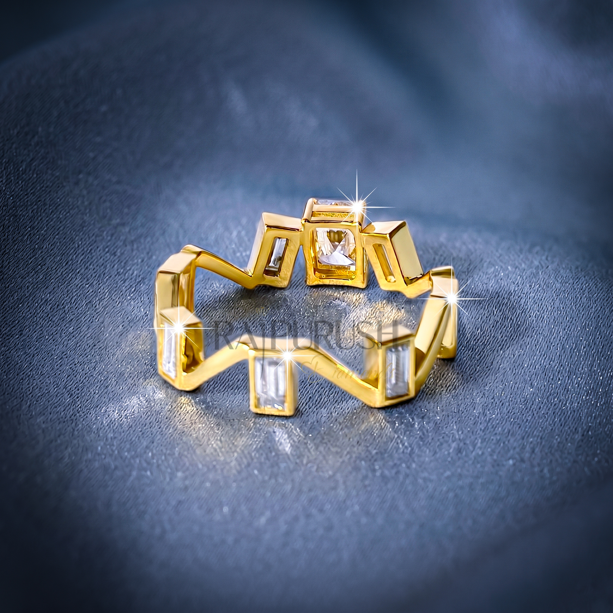 Close-up of a radiant cut and baguette moissanite engagement ring in 14k yellow gold plated sterling silver