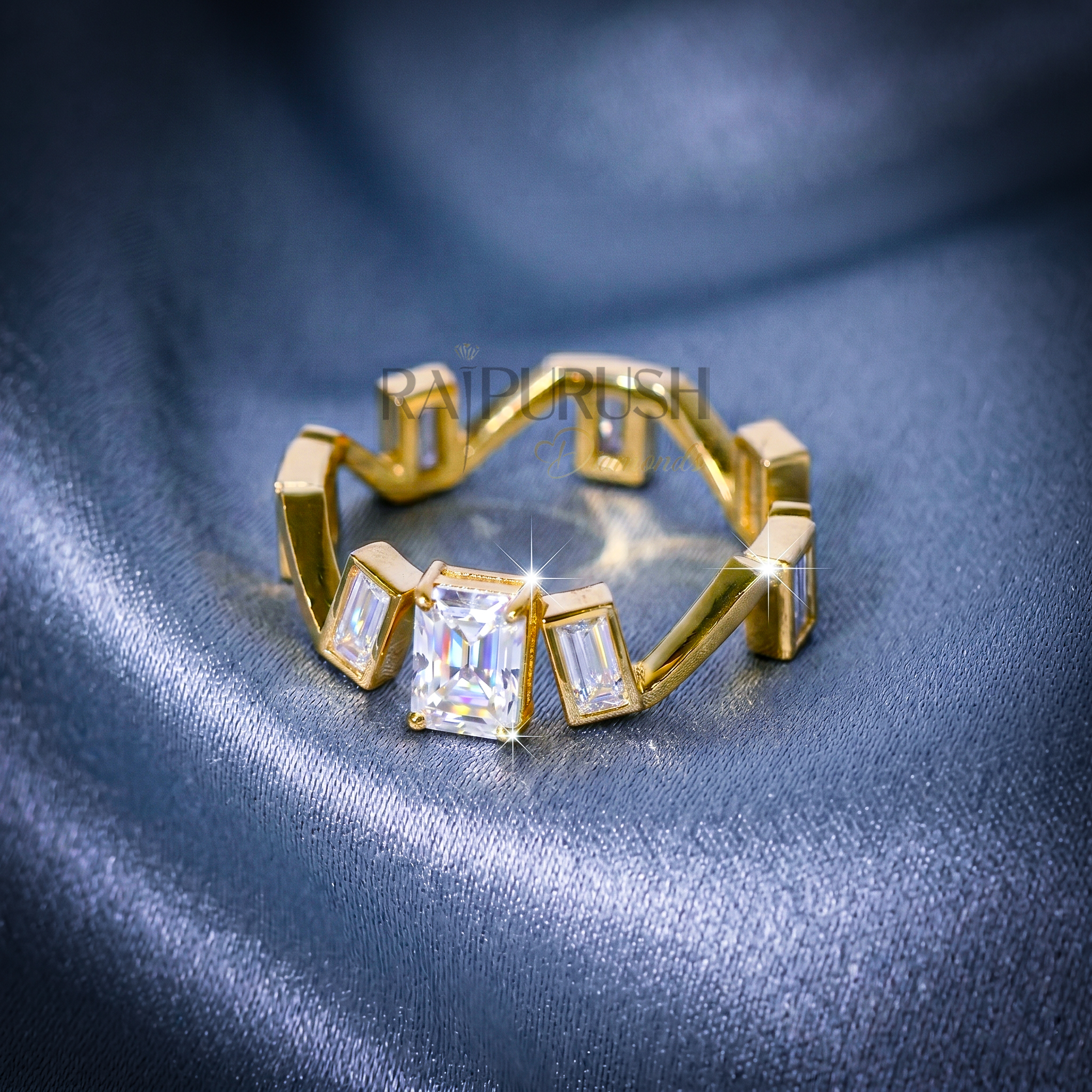 Close-up of a radiant cut and baguette moissanite engagement ring in 14k yellow gold plated sterling silver