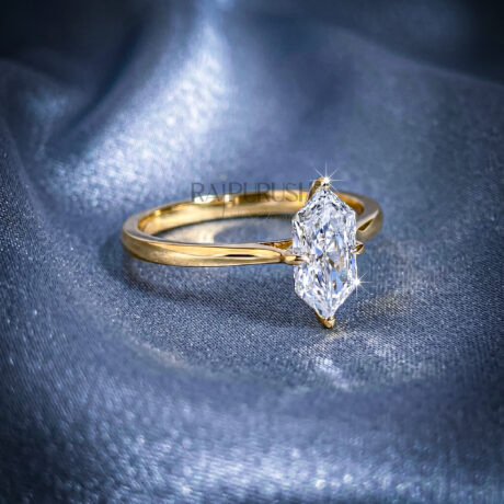 A striking Dutch Marquise cut moissanite engagement ring featuring a sleek solitaire setting in 14k gold-plated silver