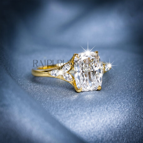 a stunning engagement ring featuring a large Cushion cut center stone flanked by marquise cut side stones in 14k gold-plated sterling silver