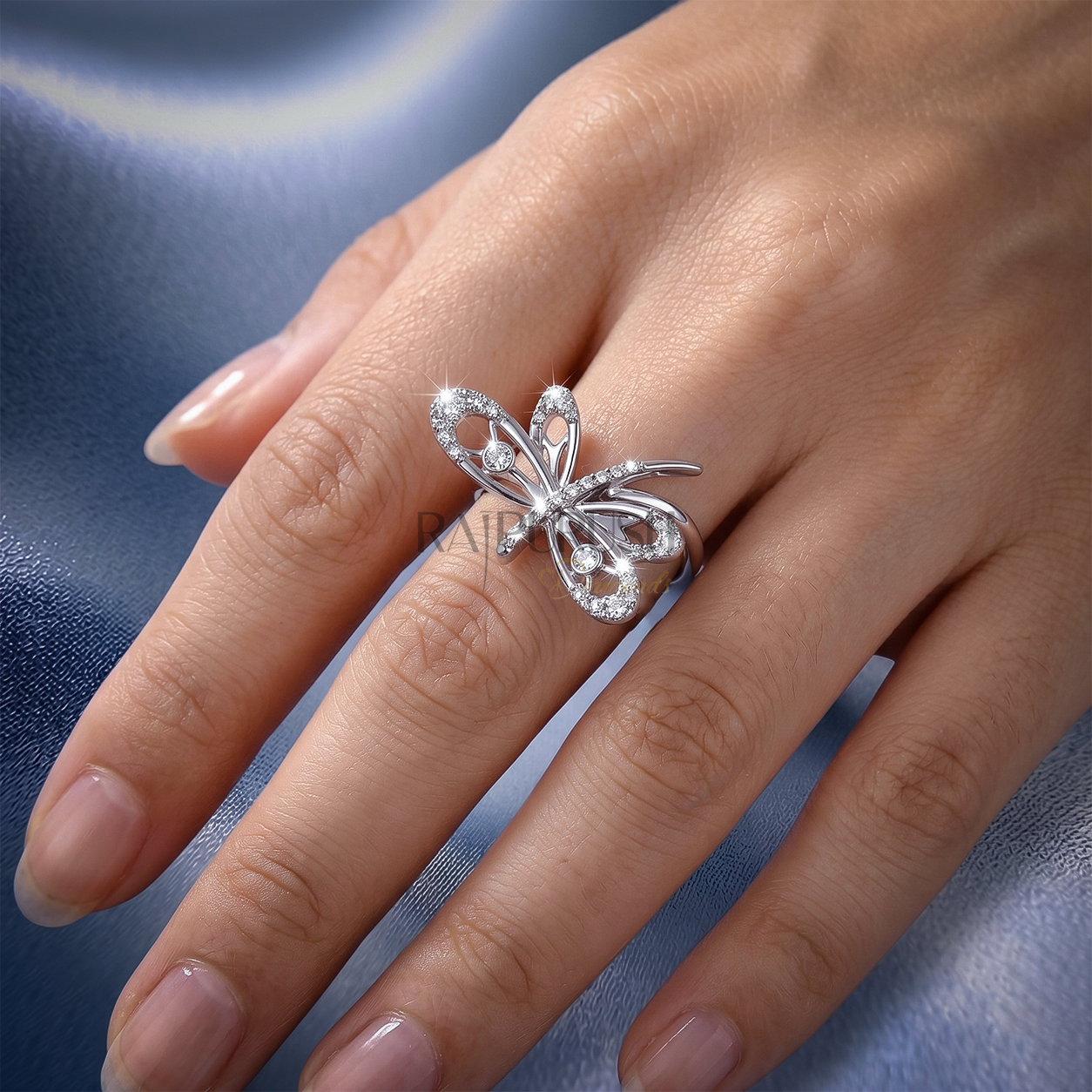 High-shine 925 sterling silver dragonfly ring featuring openwork filigree wings accent-set with brilliant round moissanite diamonds on a smooth comfort-fit band.