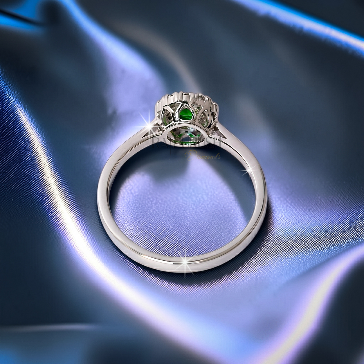 Unique nature-inspired engagement ring in S925 sterling silver featuring a textured twig branch band accented with marquise diamond leaves and a round moissanite center stone.