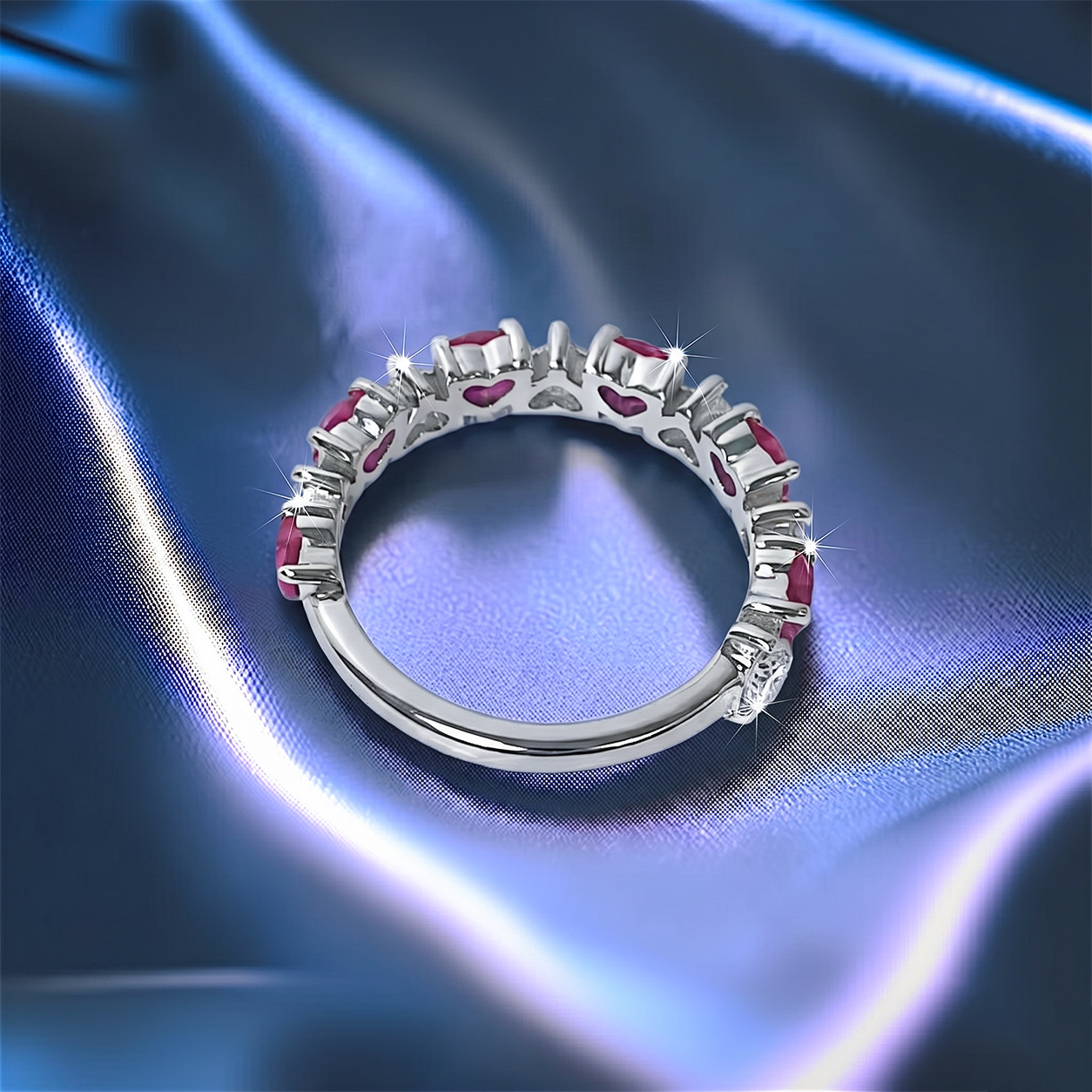 Romantic heart-shaped moissanite diamond eternity wedding band in S925 sterling silver, featuring a continuous row of shared-prong heart stones in a low-profile stackable layout.
