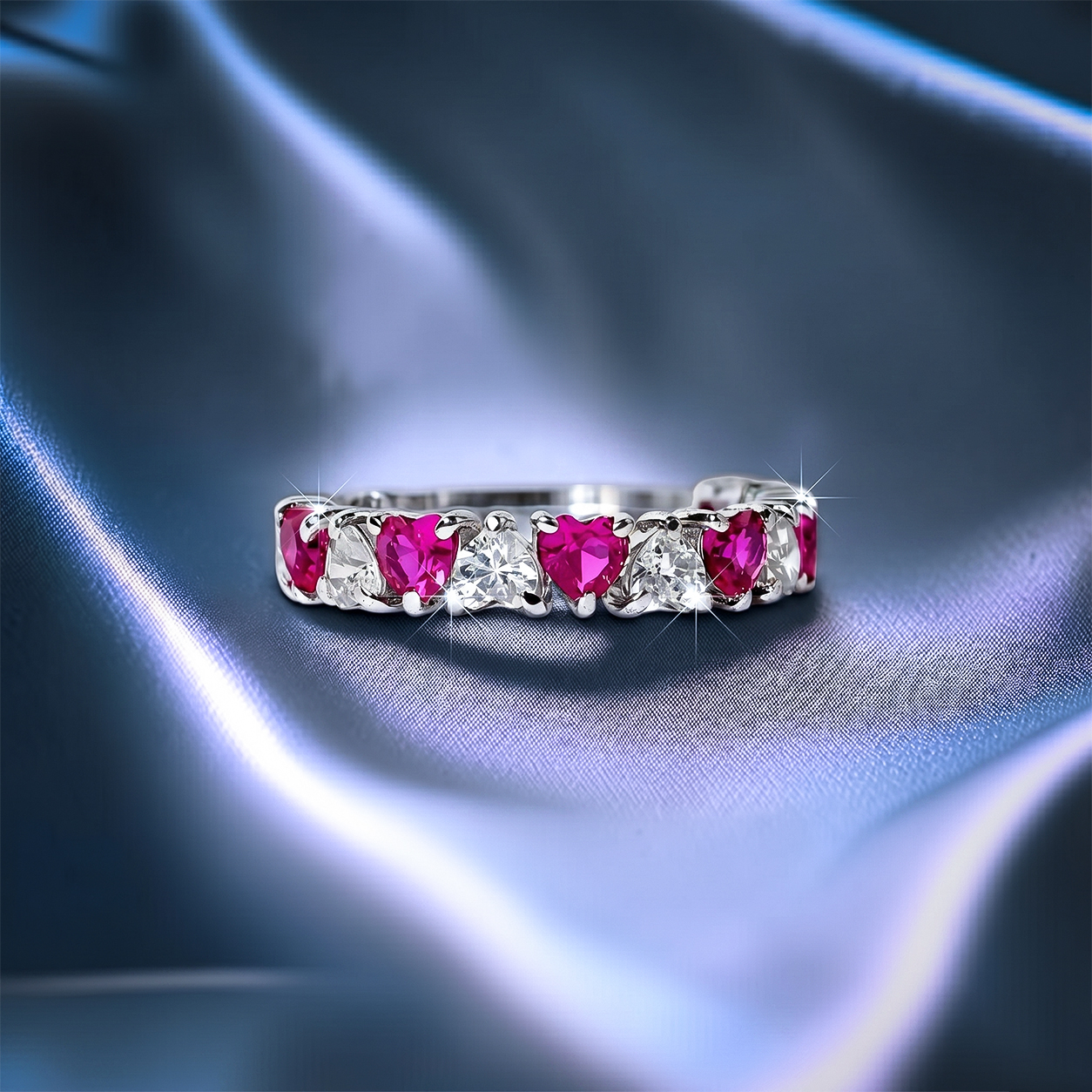 Romantic heart-shaped moissanite diamond eternity wedding band in S925 sterling silver, featuring a continuous row of shared-prong heart stones in a low-profile stackable layout.