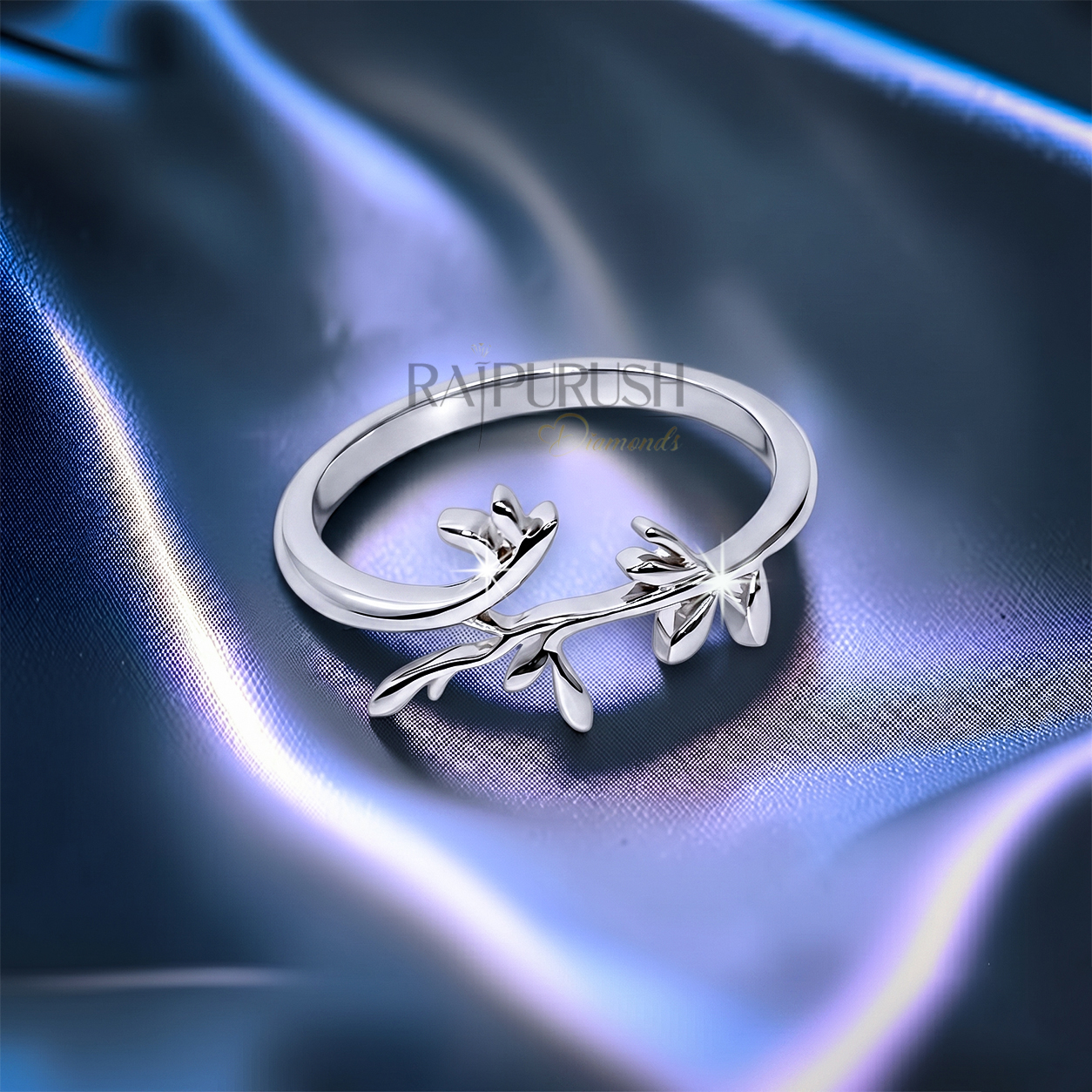 High-polish 925 sterling silver nature-inspired wedding band featuring a delicate bypassing leaf and vine branch motif in a stackable boho bridal style.