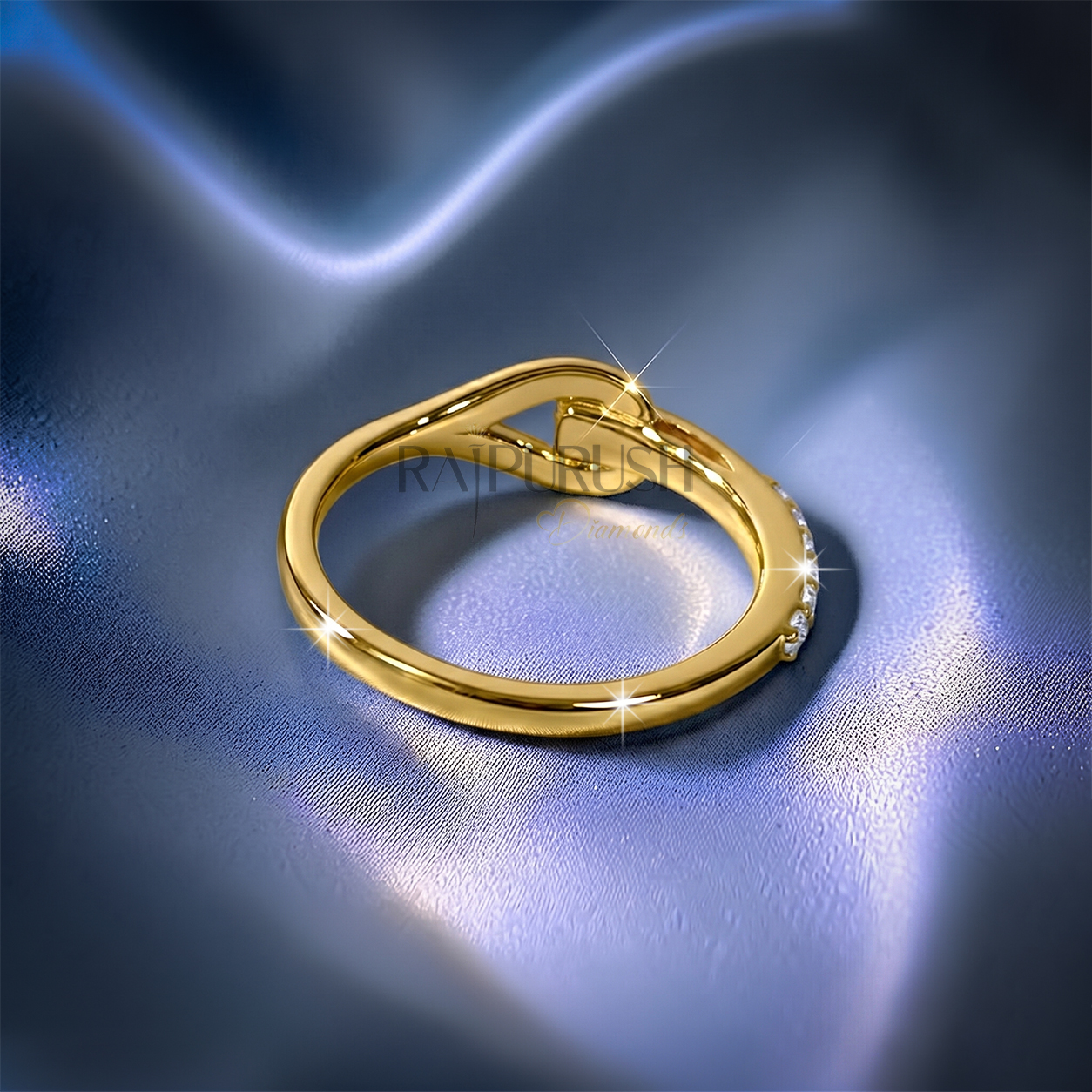 Elegant 14K gold plated silver band featuring sparkling moissanite accents in a modern interlocking design.