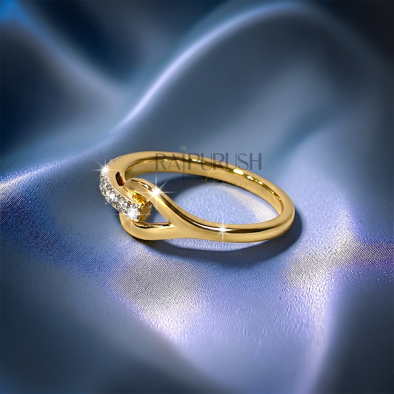 Elegant 14K gold plated silver band featuring sparkling moissanite accents in a modern interlocking design.